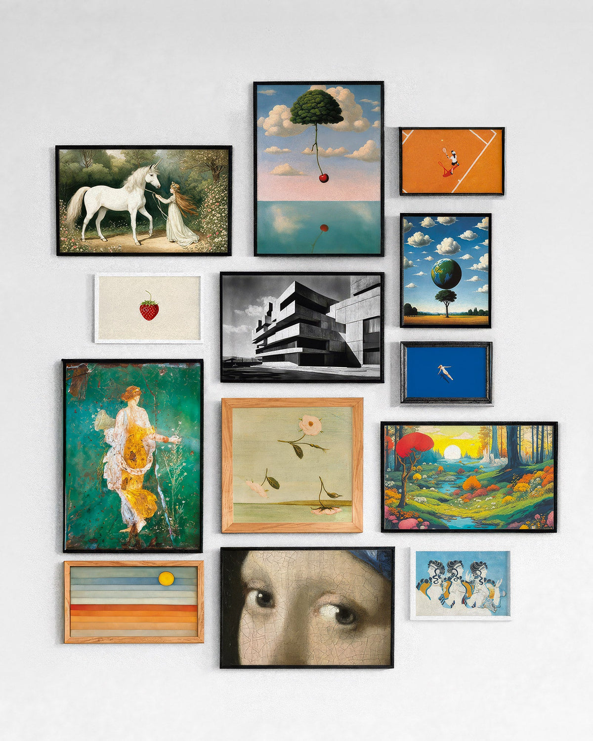 Gallery wall of framed Posterscape posters mixing art classics, surreal landscapes, architecture and abstract designs