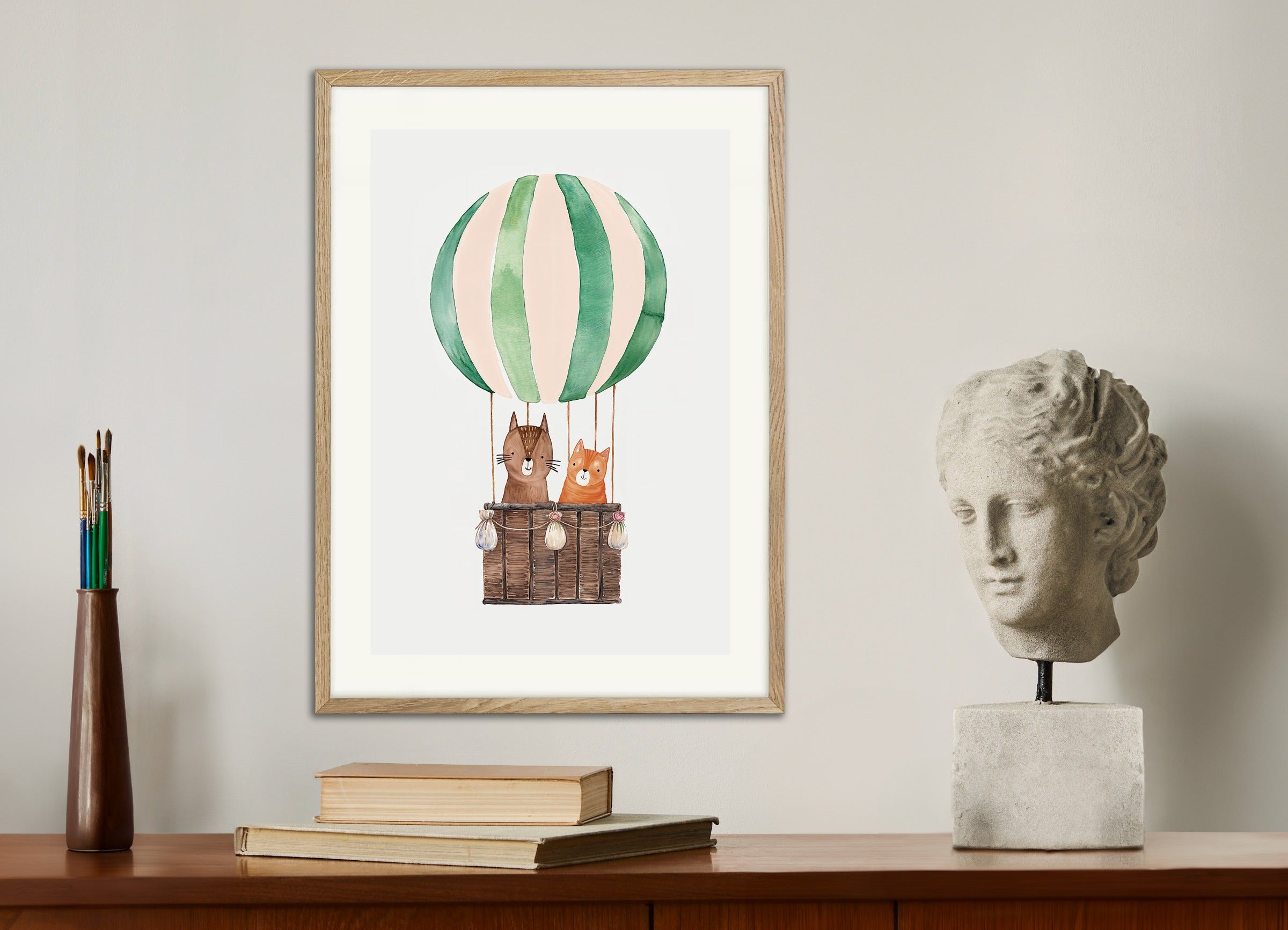 Poster with natural wood frame: Two cats travel in a hot air balloon
