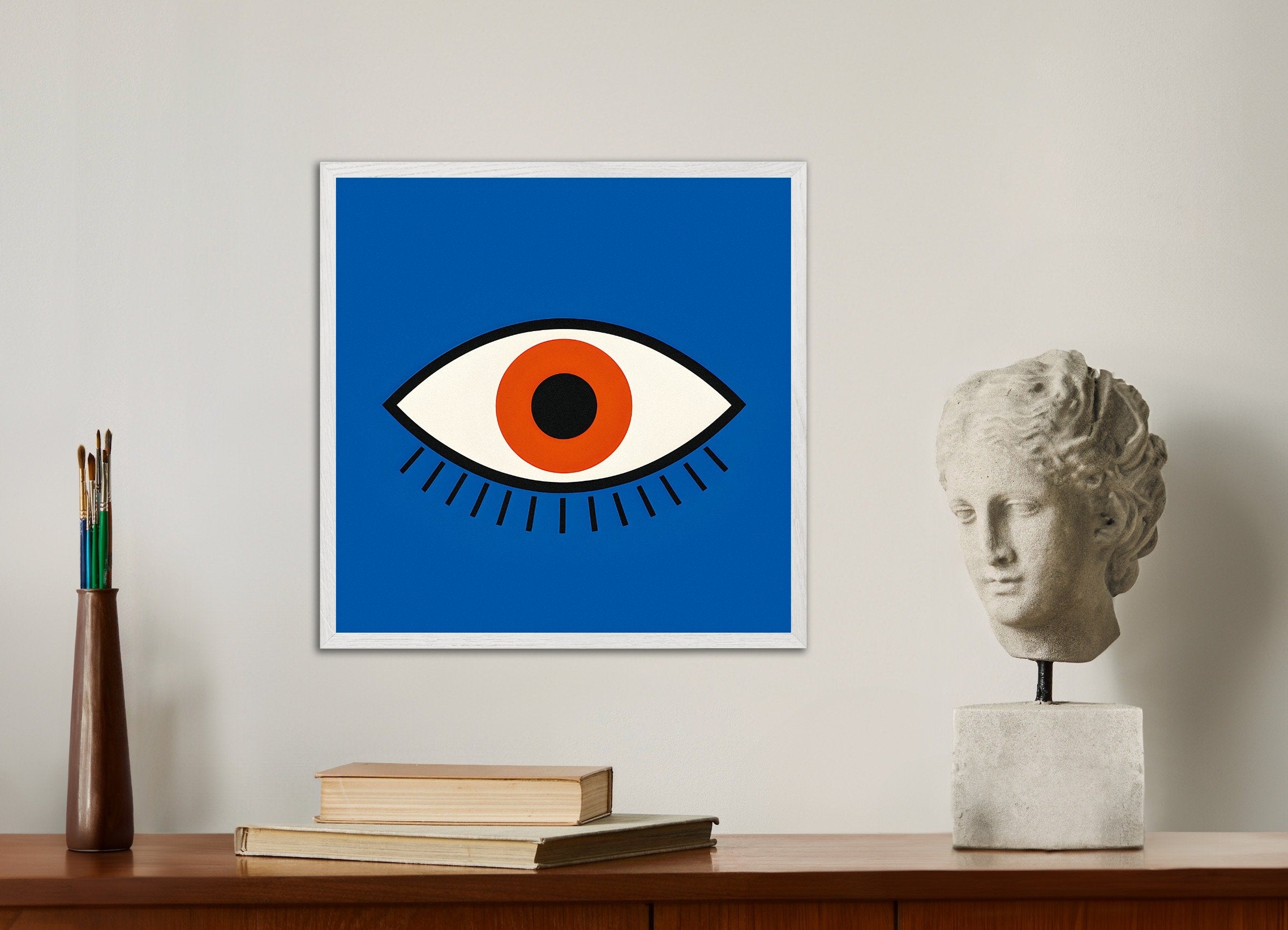 Poster of The Eye, with white wooden frame